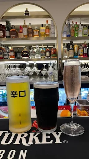 Beers and champagne lined up on the bar