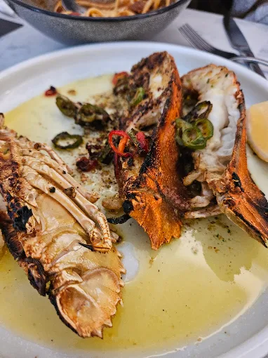 Grilled seafood in butter sauce