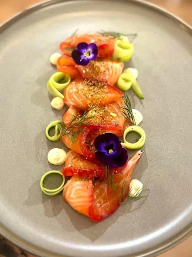 Cured Tasmanian salmon plated with edible flowers